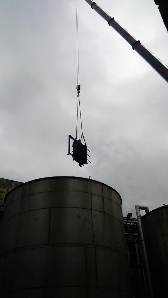 plate heat exchanger lifted by crane